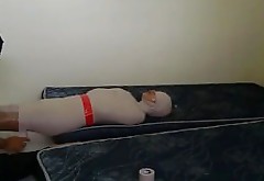 Indonesian Girl Wrapped In Mummification And Breathplay
